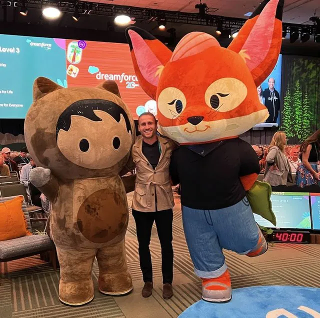 Me at Dreamforce between the Astro and Codey mascots